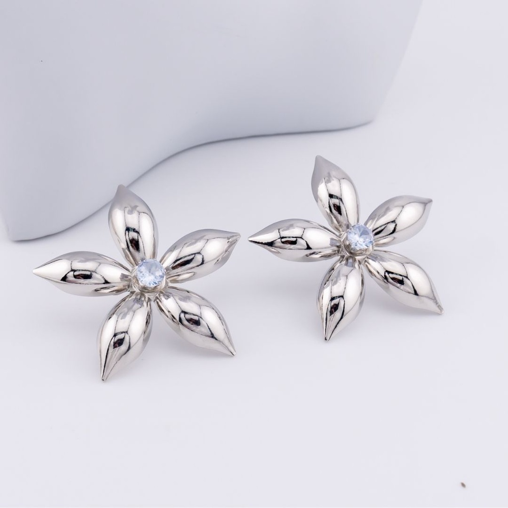 Aretes flor chunky baño 18k