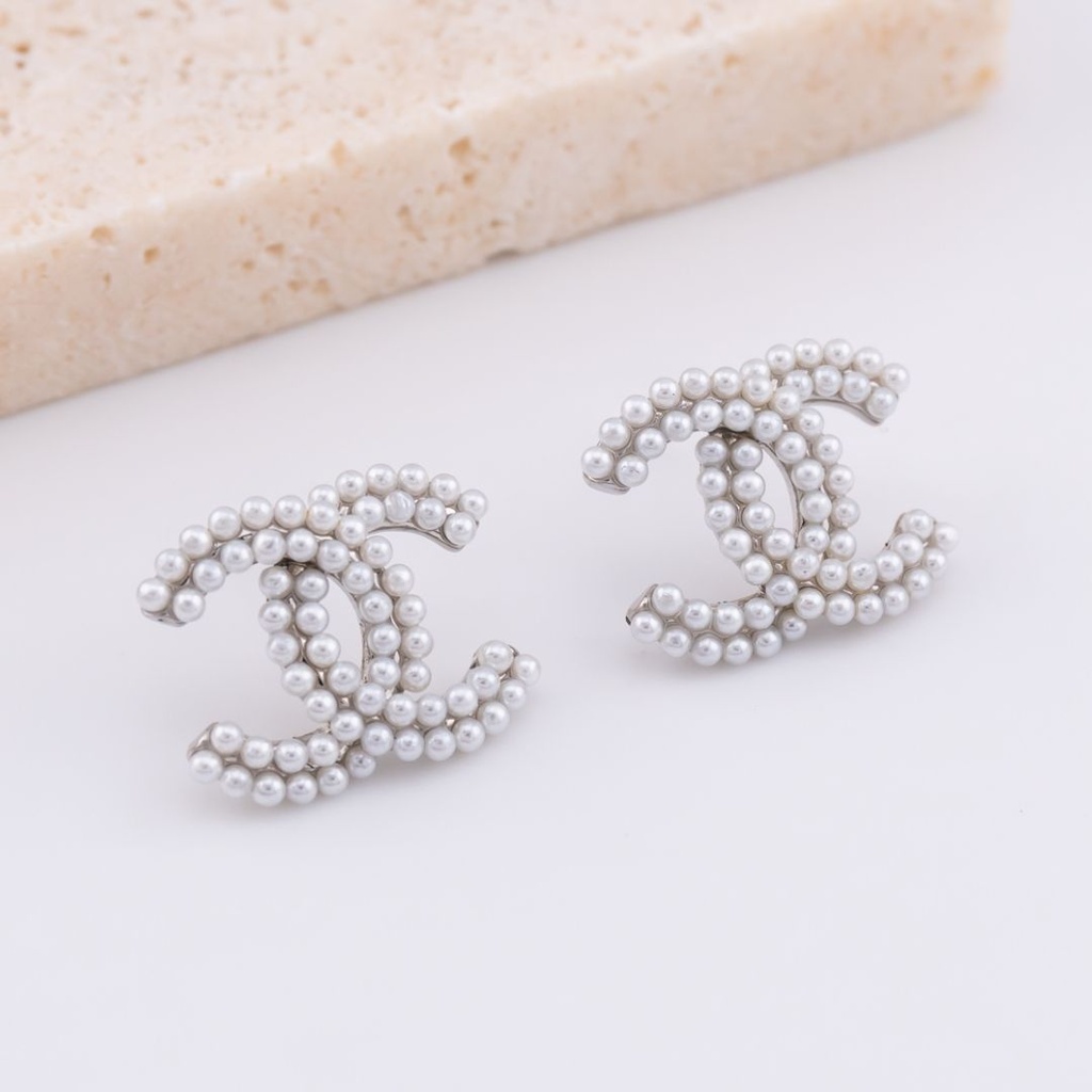 Aretes CH con perlas BAÑO 18K