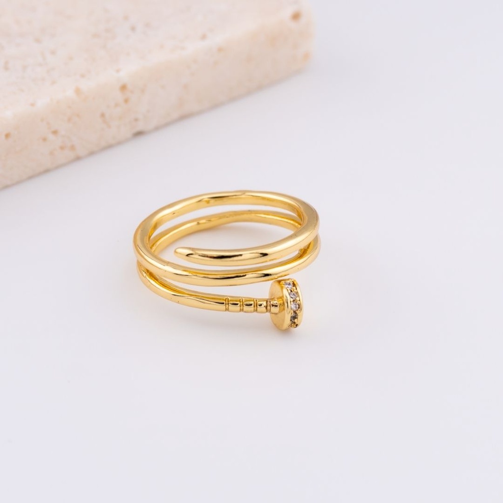 Anillo clavo con zirconia baño 18k