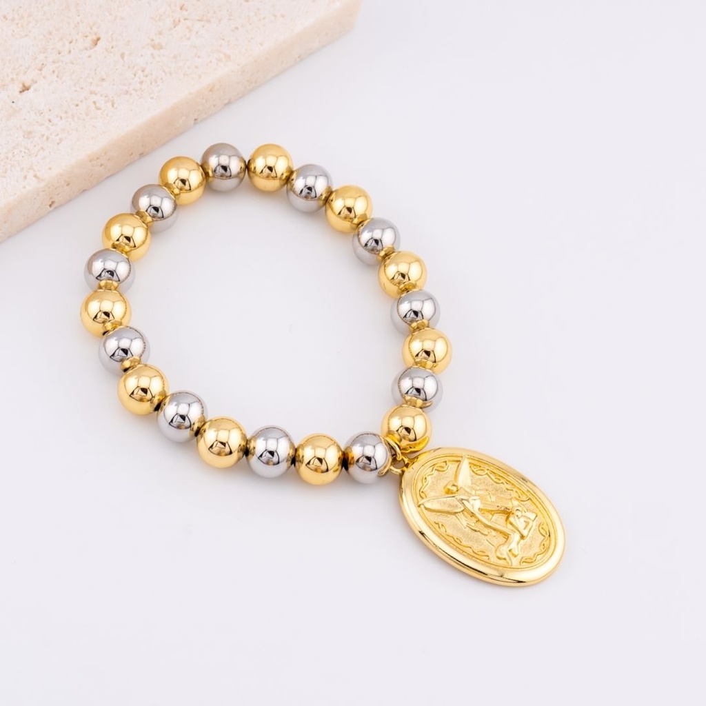 Pulsera elastica bolitas dos tonos baño 18k, con medalla religiosa