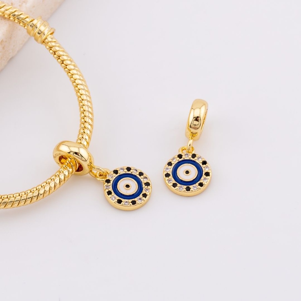 Dije charm OJO TURCO estilo pandora  baño de 18k