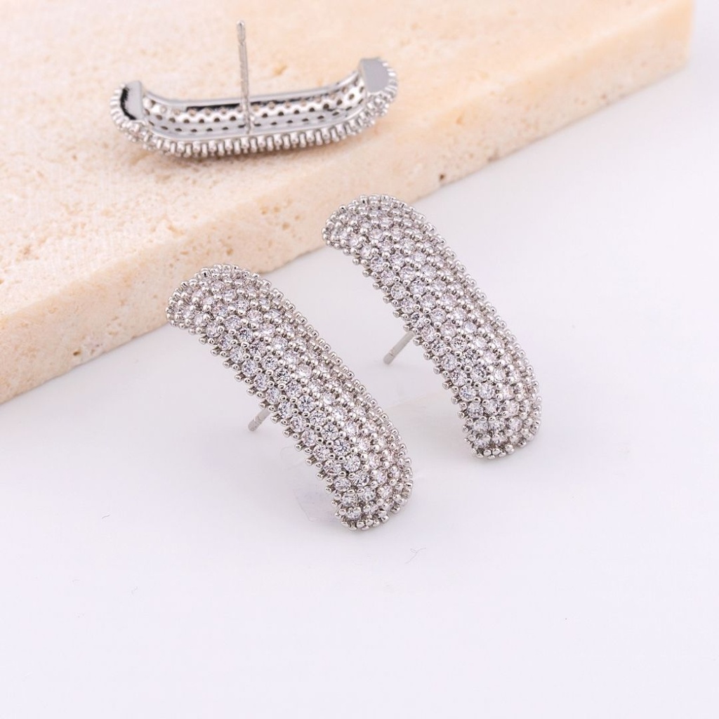 Aretes con zirconias pin en el centro BAÑO 18K