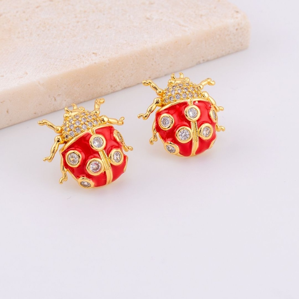 Aretes mariquita zirconia baño 18k