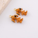 DIje snoopy  esmaltado baño de 18k