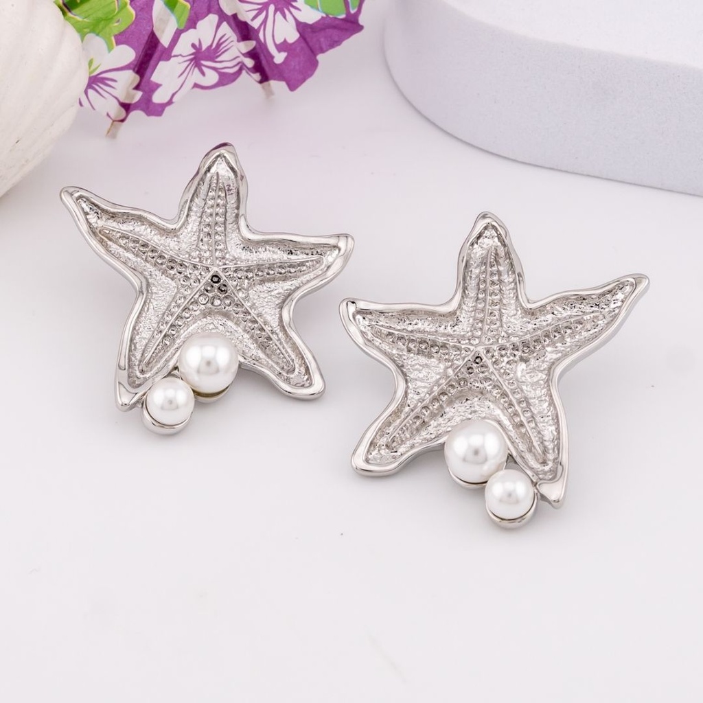 Aretes chunky estrella de mar baño 18k