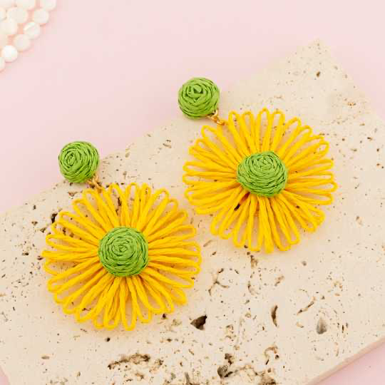 Aretes rafia de flor baño 18k