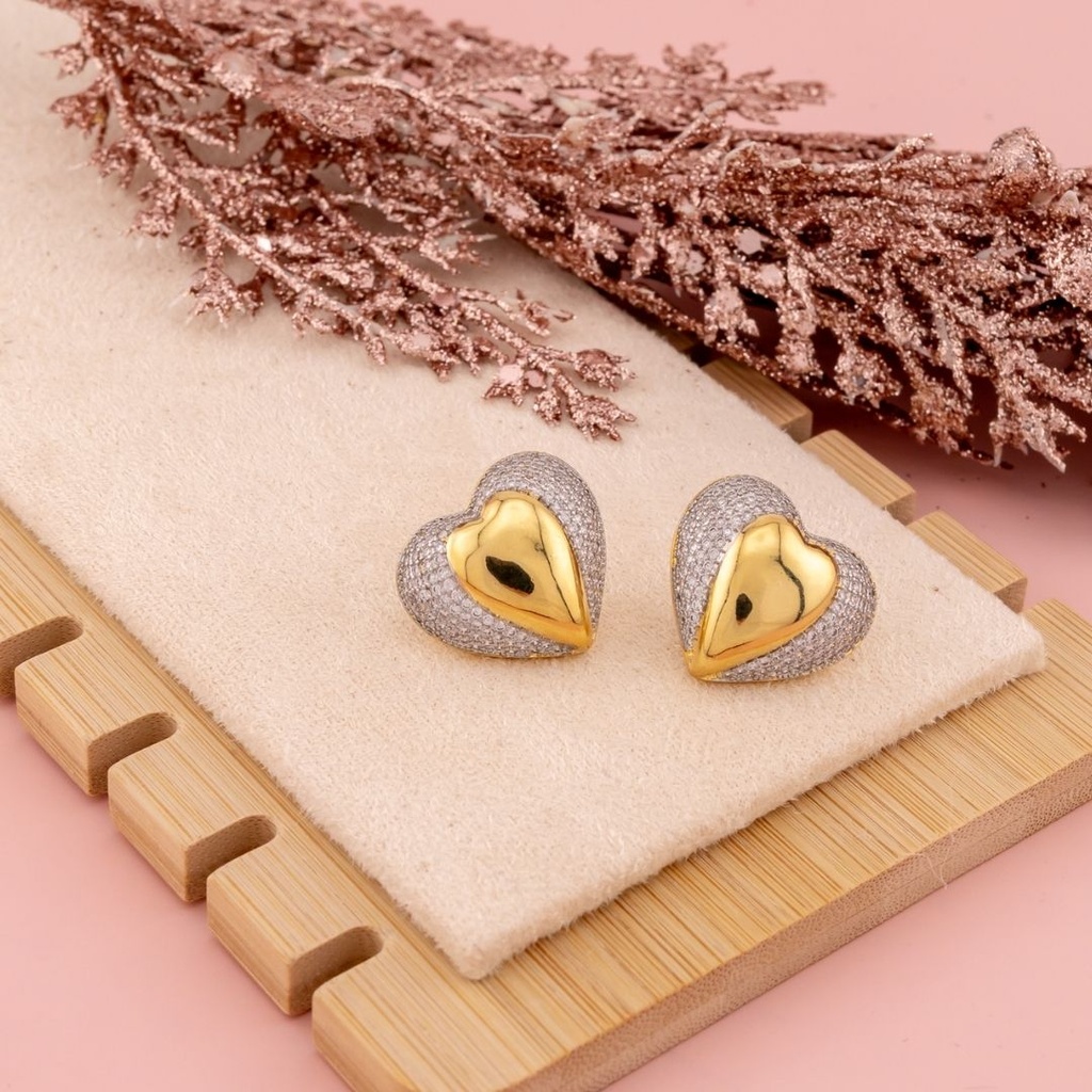 Aretes stud de corazon doble tono baño 18k