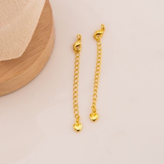 Broche extension con colgante de corazon baño 18k