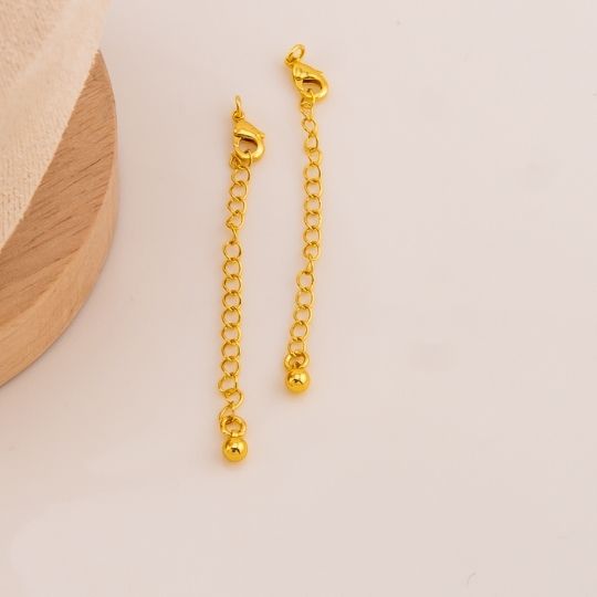 Broche extension con colgante baño 18k