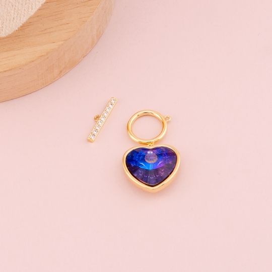 Broche T con colgante de corazon baño 18k 