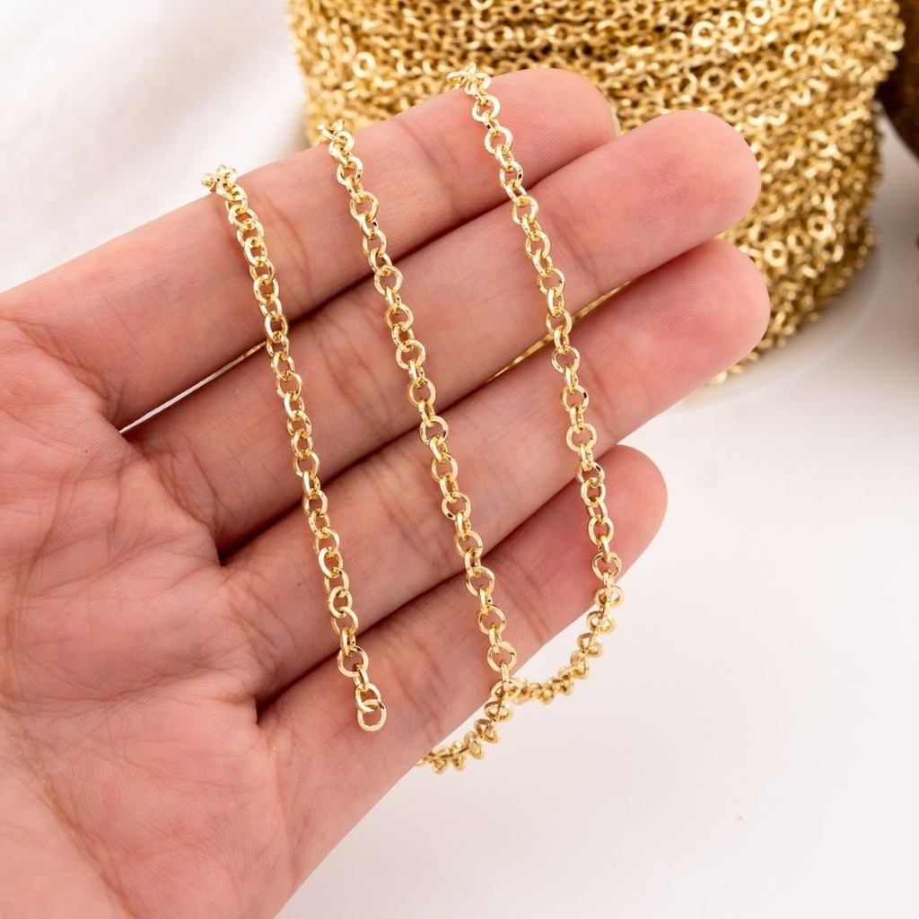 Cadena acero delgada por yarda con baño 18k