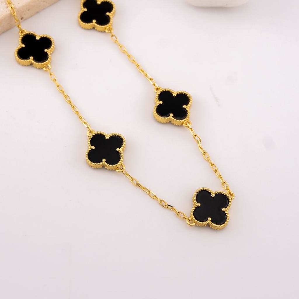 Collar con 8 separadores en forma de trebol baño 18k