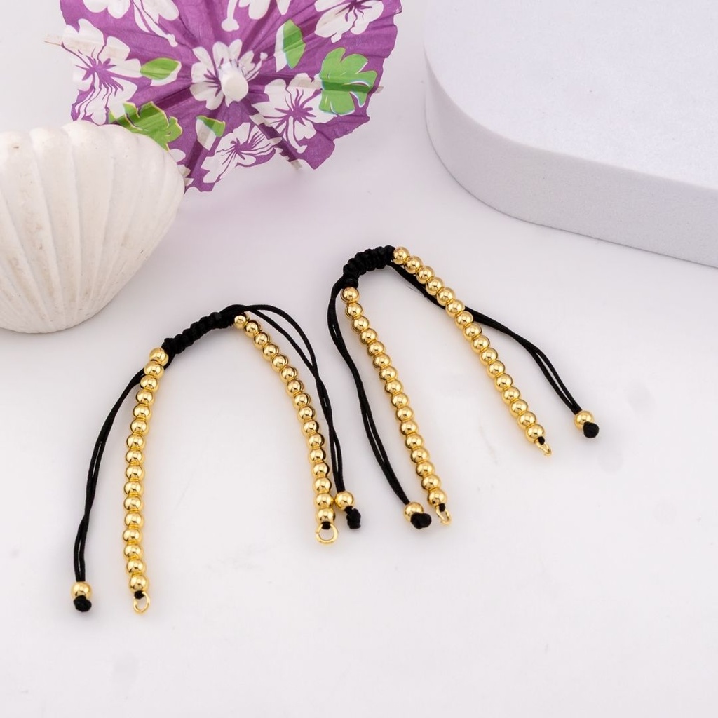 Pulsera ajustable con balines baño 18k negra