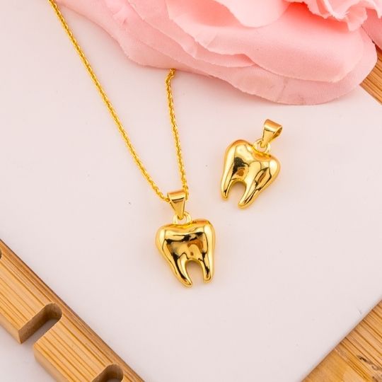 Dije de diente baño 18k