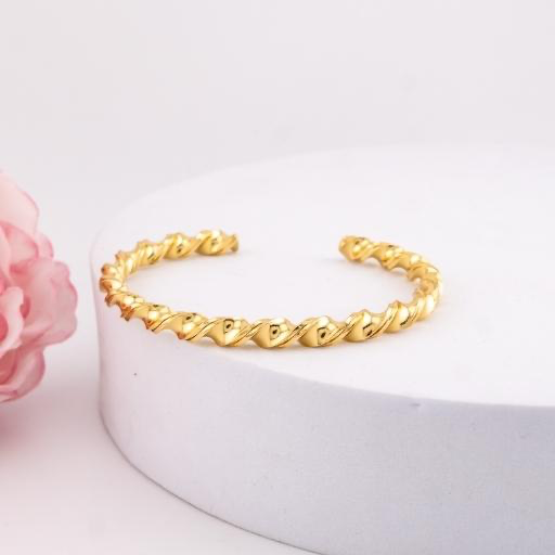 Brazalete retorcido baño 18k