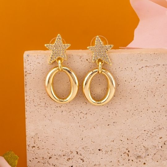Aretes de estrella colgantes con zirconias baño 18k