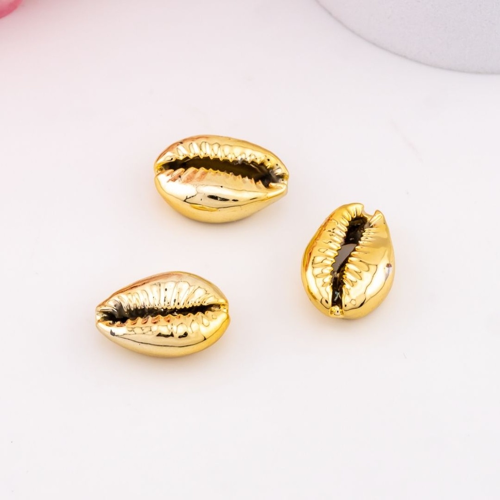 Separador concha de mar de colores dorado