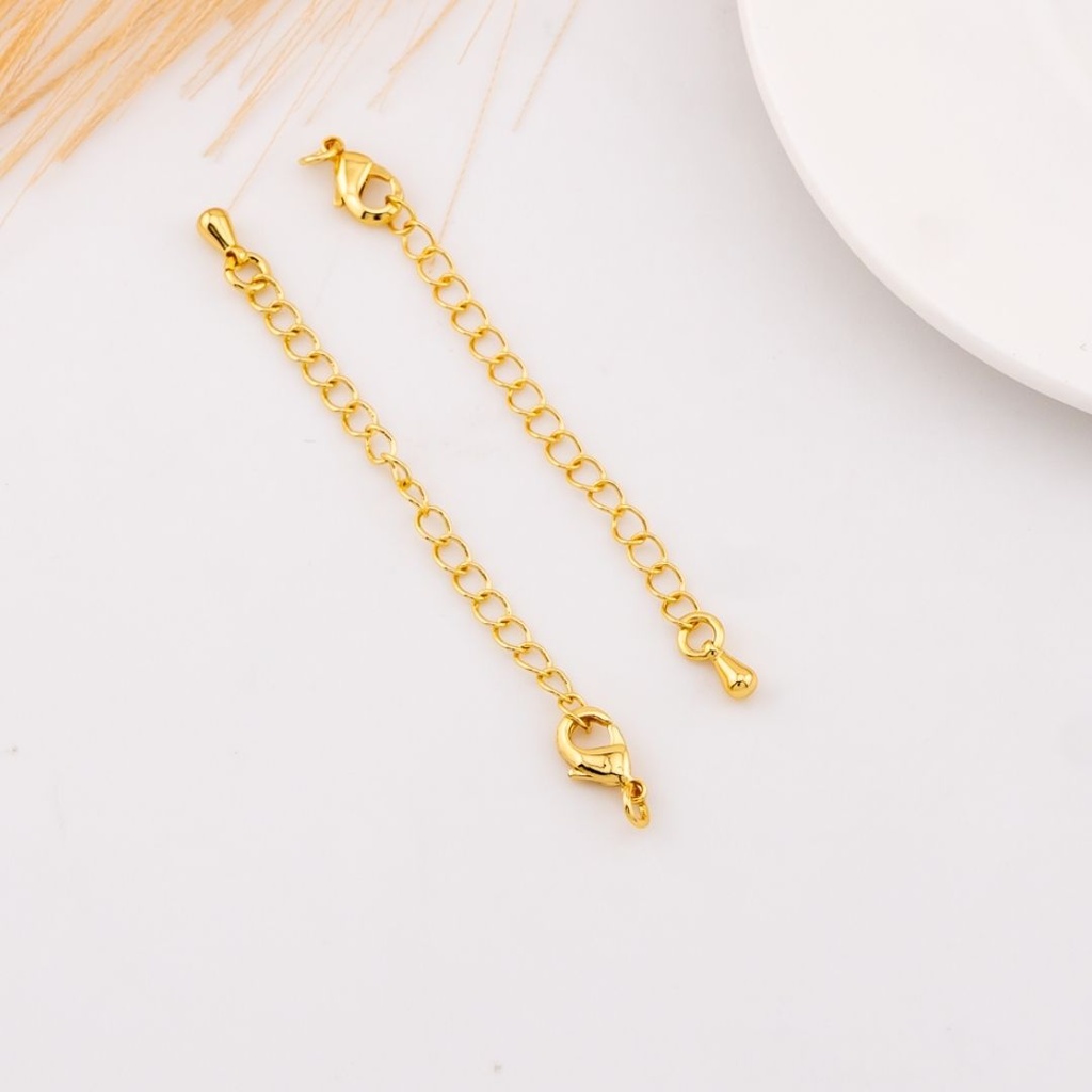 Broche perico con extension baño 18k