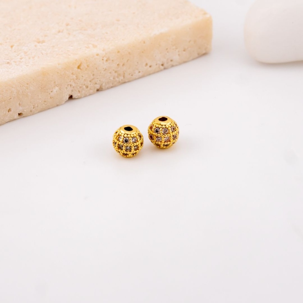 Separador bolita 6 mm con micropave y baño 18k