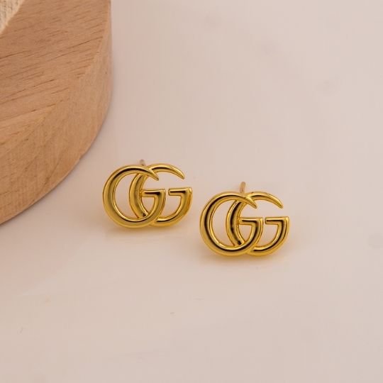 Aretes stud de marca solidos baño 18k