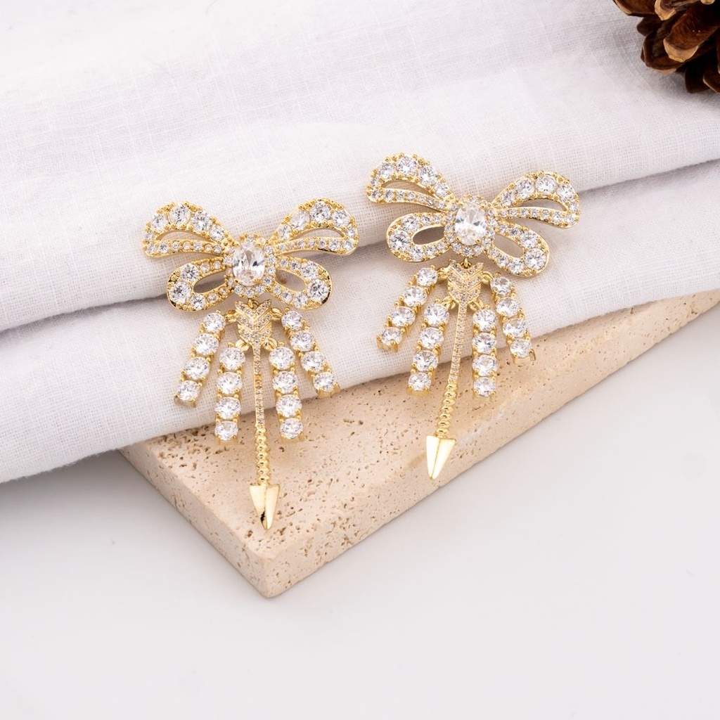 Aretes stud chongo con zirconia plata baño 18k premiun