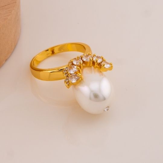 Anillo con perla natural y zirconias baño 18k