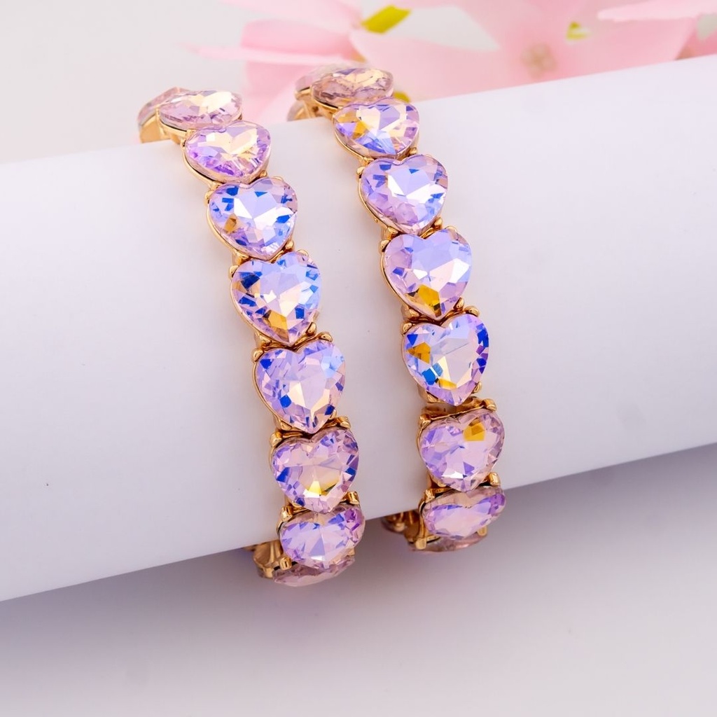 Pulsera elastica de corazones baño 18k 