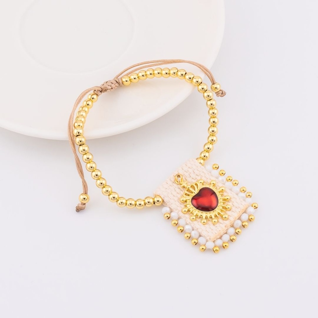 Pulsera ajustable con escapulario tejido a mano con  baño 18k