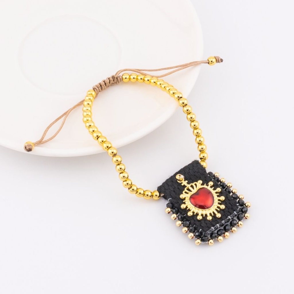 Pulsera ajustable con escapulario tejido a mano con  baño 18k