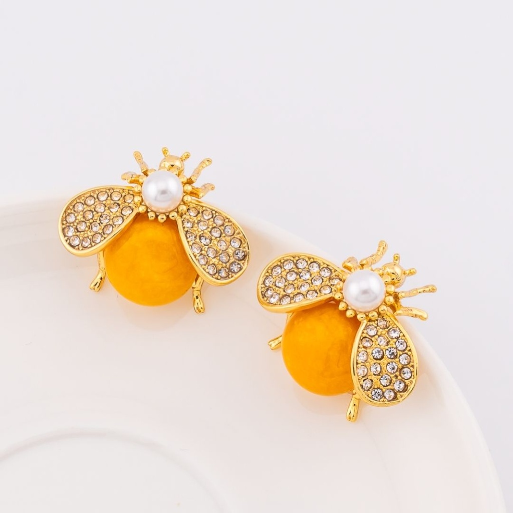 Aretes insecto con zirconias, perla piedra shell y baño 18k