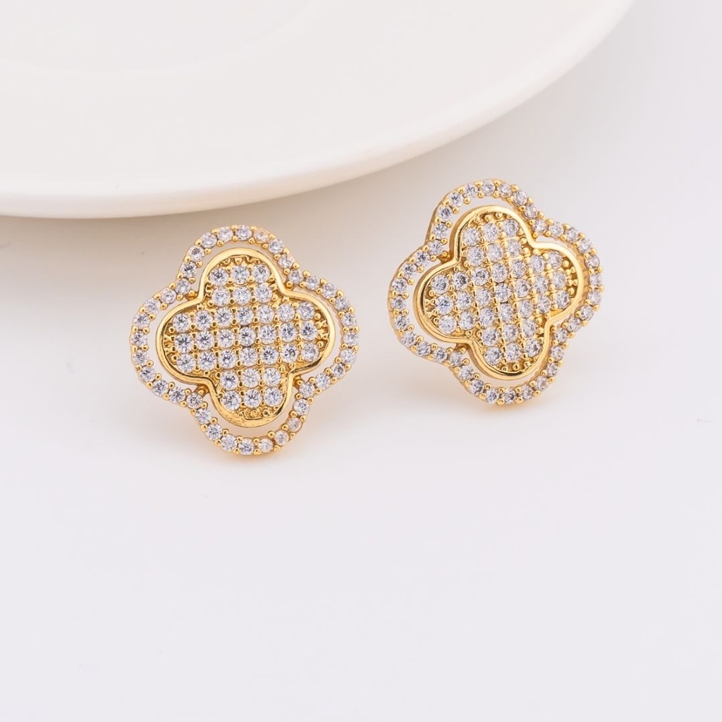 Aretes trebol con zirconias y baño 18k