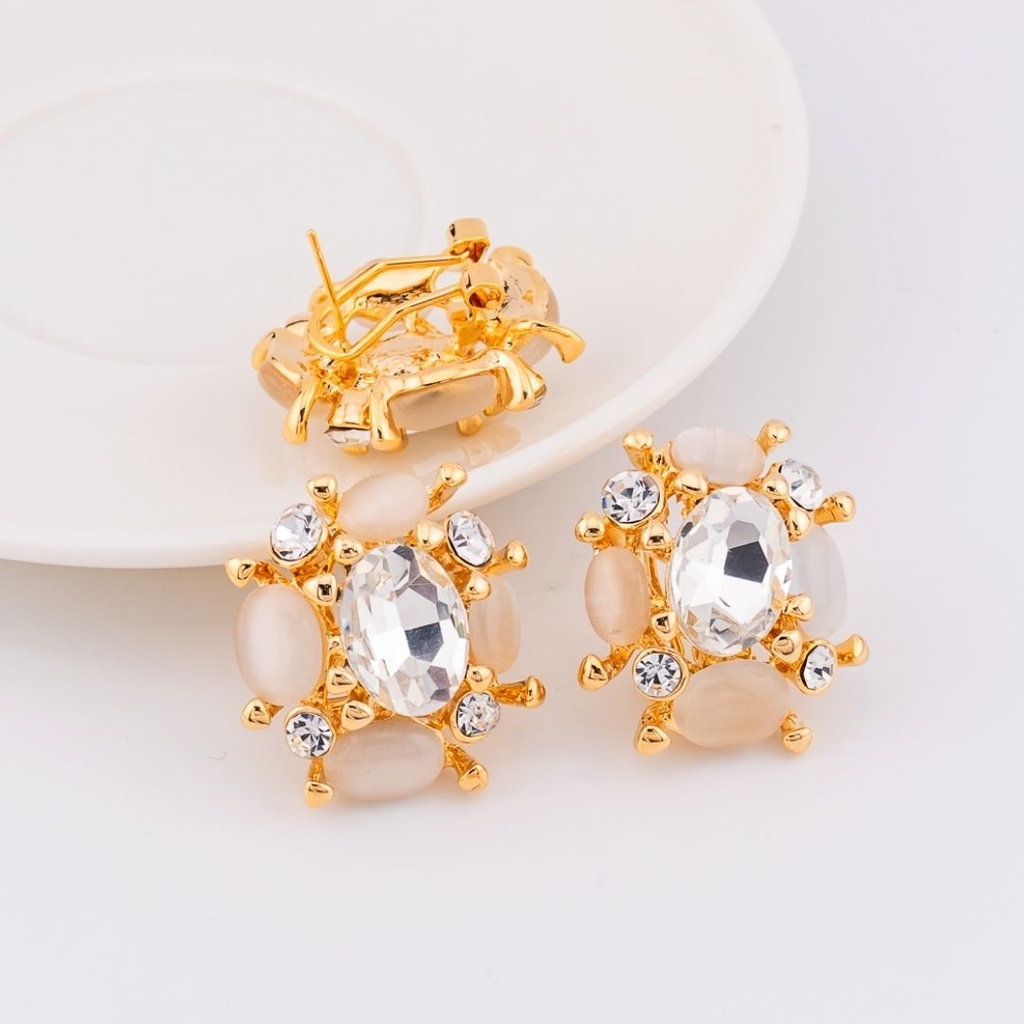 Aretes piedra opalo con zirconias patente omega y baño 18k