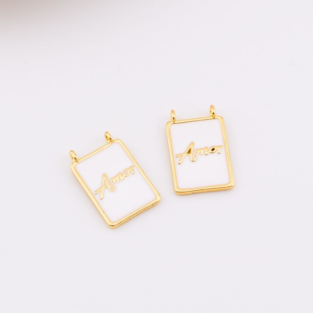 Dije medalla esmaltada amorl baño 18k 