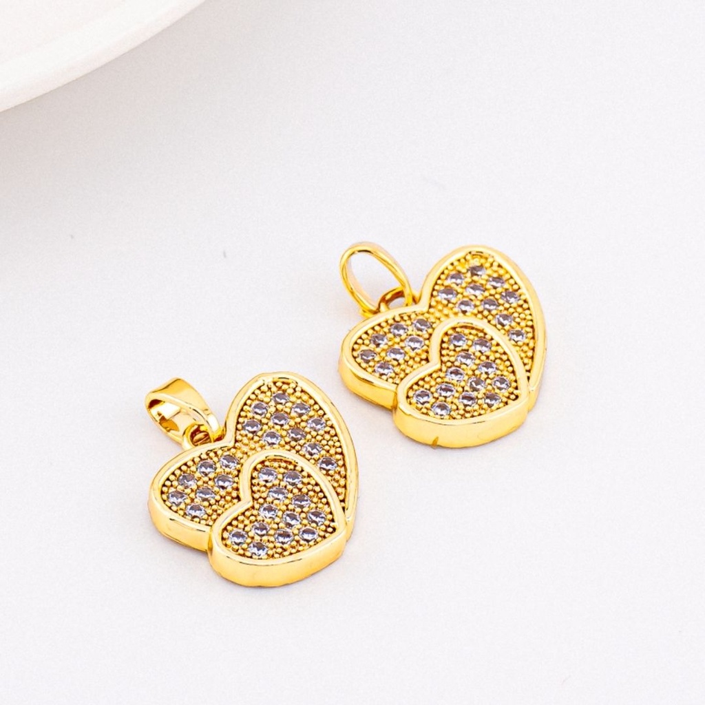 Dije doble corazon Micropave y baño 18k