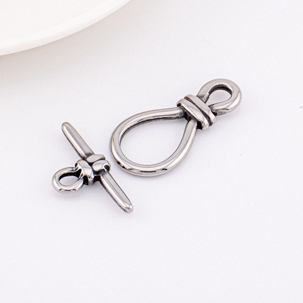 Broche T vintage en acero inoxidable