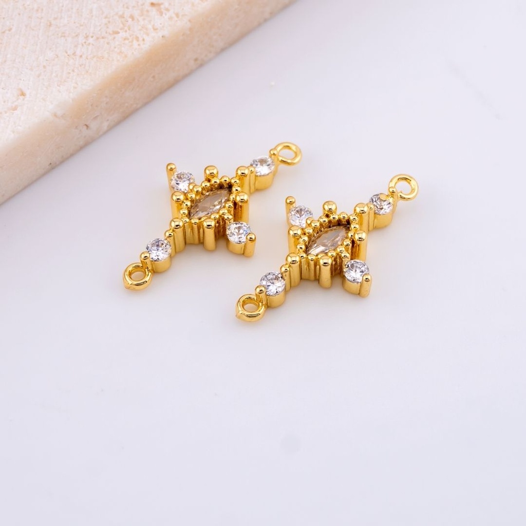Enlace micropave forma de cruz con baño 18k