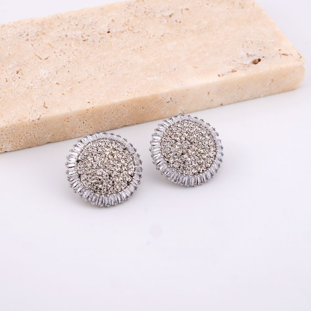 Aretes boton con zirconia baño 18k pin de plata