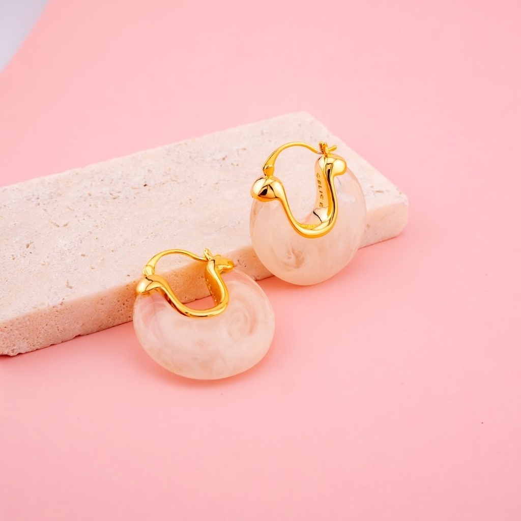 Aretes argolla en carey con baño 18k