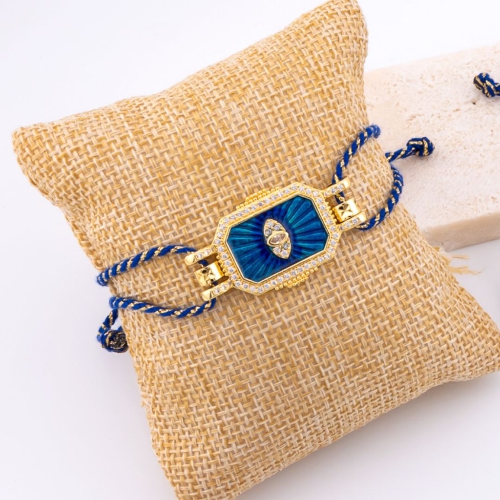 Pulsera correa ajustable de hilo metalizado en forma de ojo con zirconia esmaltado baño 18k 
