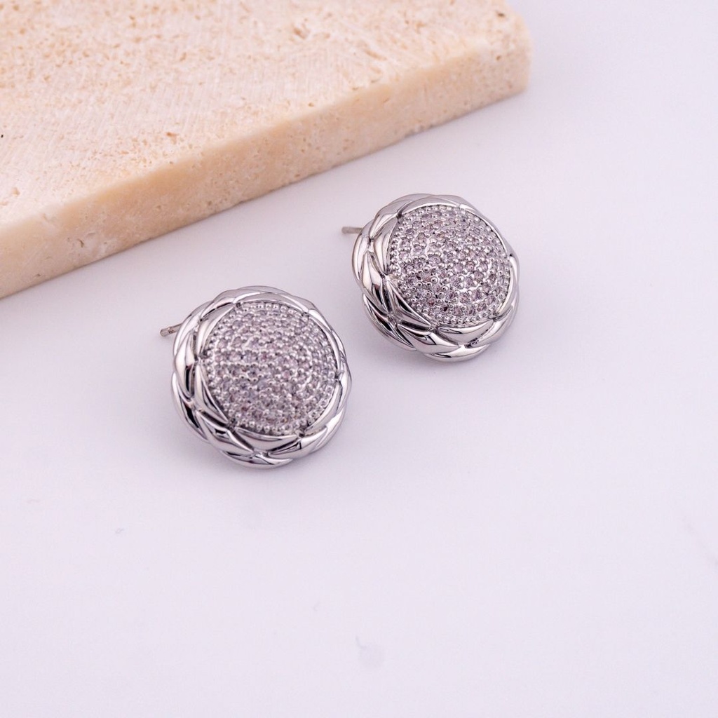 Aretes stud flor con zirconias baño 18k pin de plata