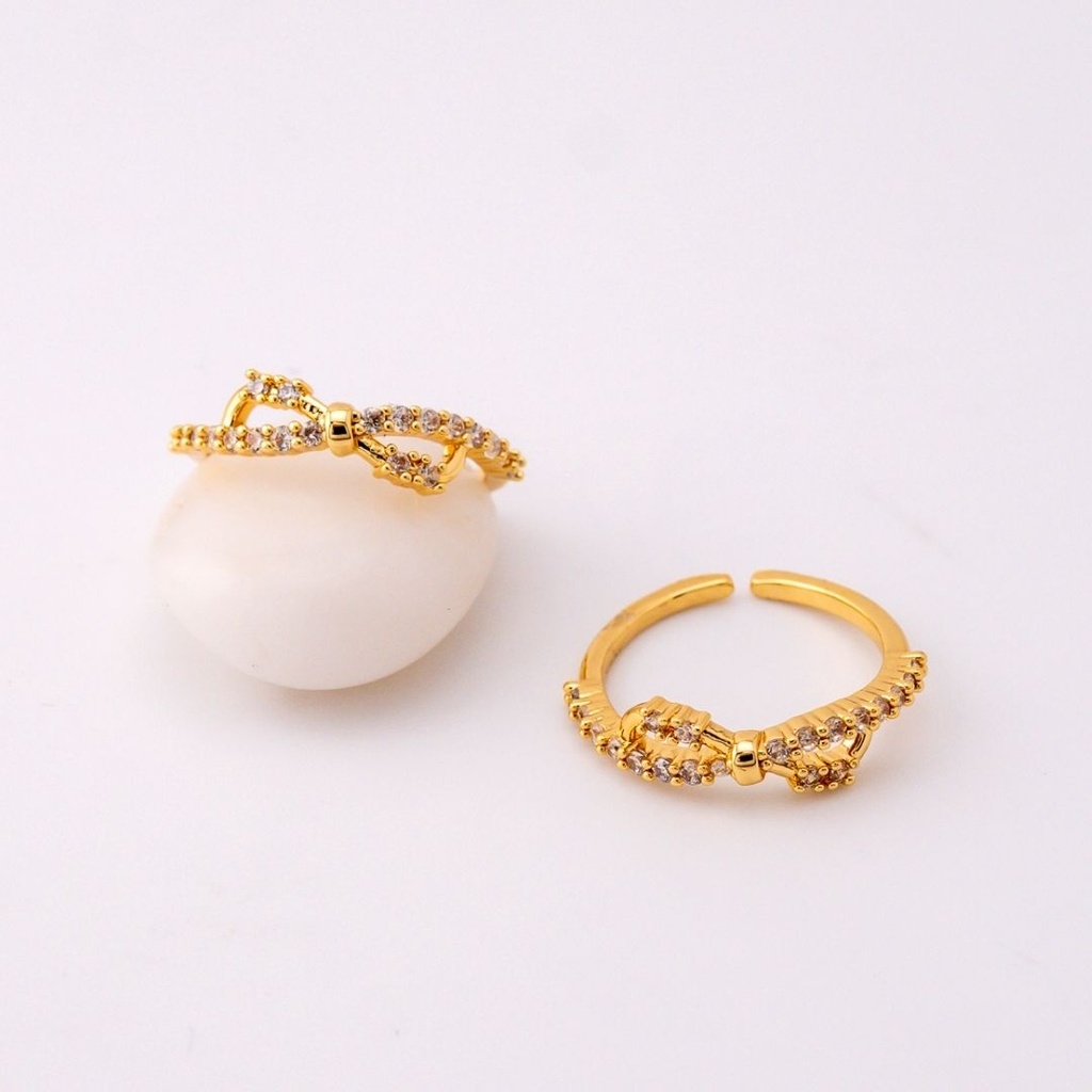 Anillo delgado ajustable con zirconias baño 18k 