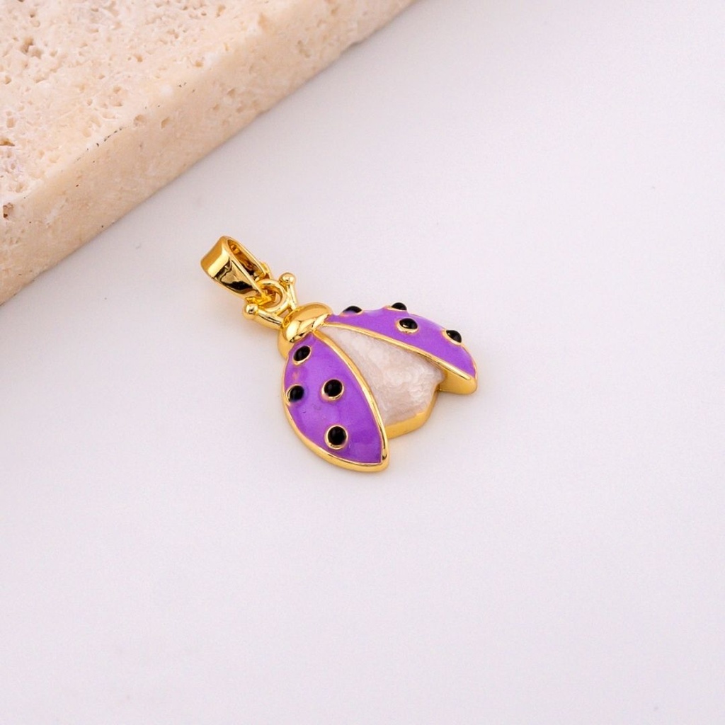  Dije mariquita esmaltado y baño 18k