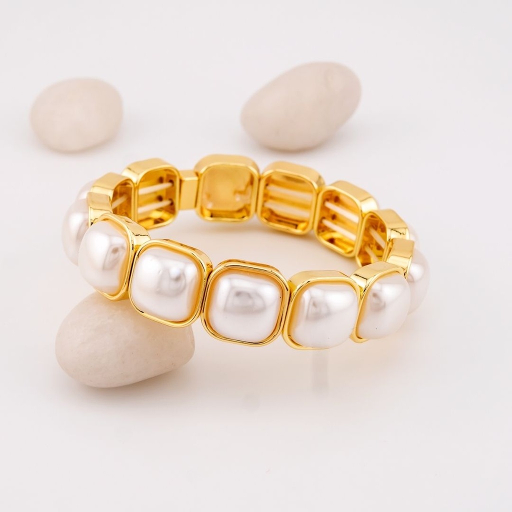 Pulsera elastica con perlas baño 18k