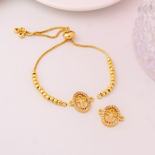 Enlace de cruz con zirconias baño 18k