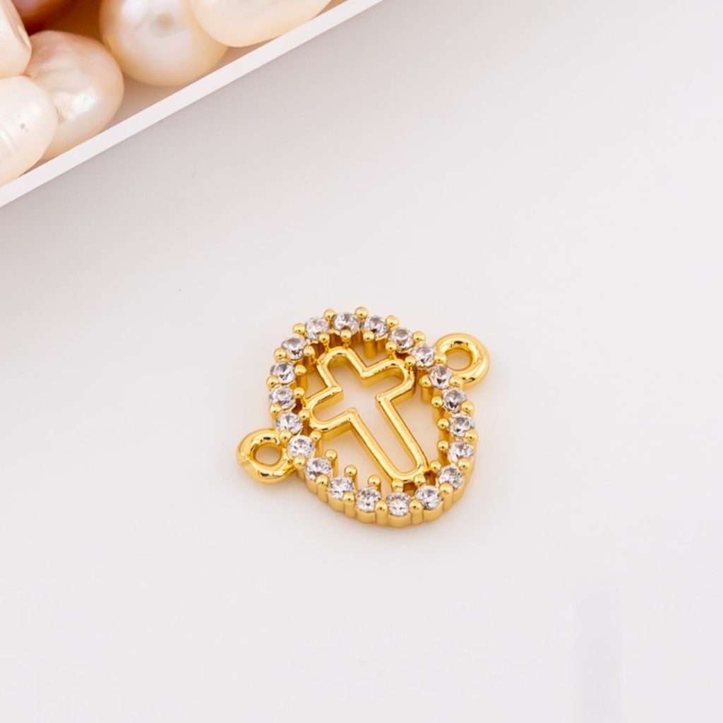 Enlace en forma de cruz religioso  micropave baño 18k