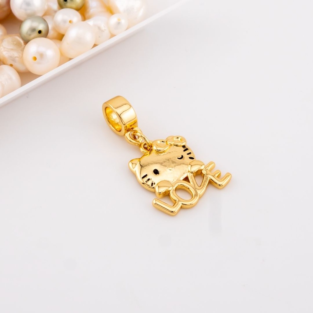 Dije estilo charm pandora  hello kitty baño 18k