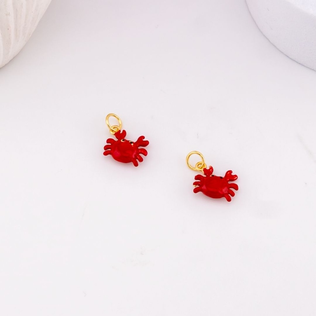 Dije cangrejito esmaltado baño 18k