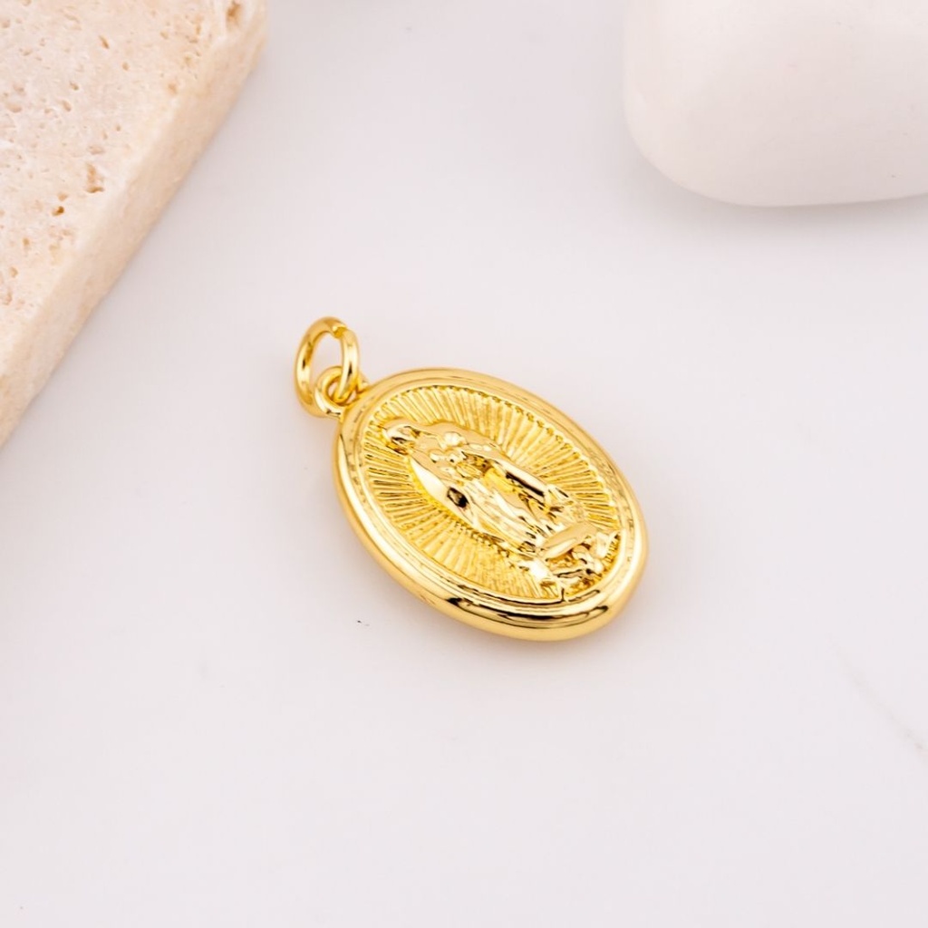 Dije religioso  baño 18k  22x15 mm