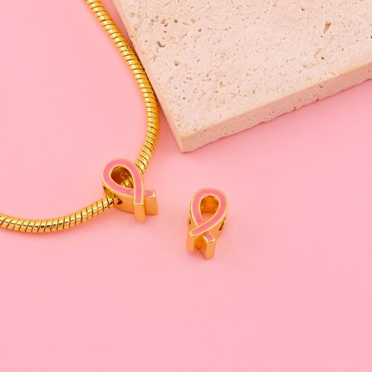 Charm lazo rosado cancer de mama baño 18k