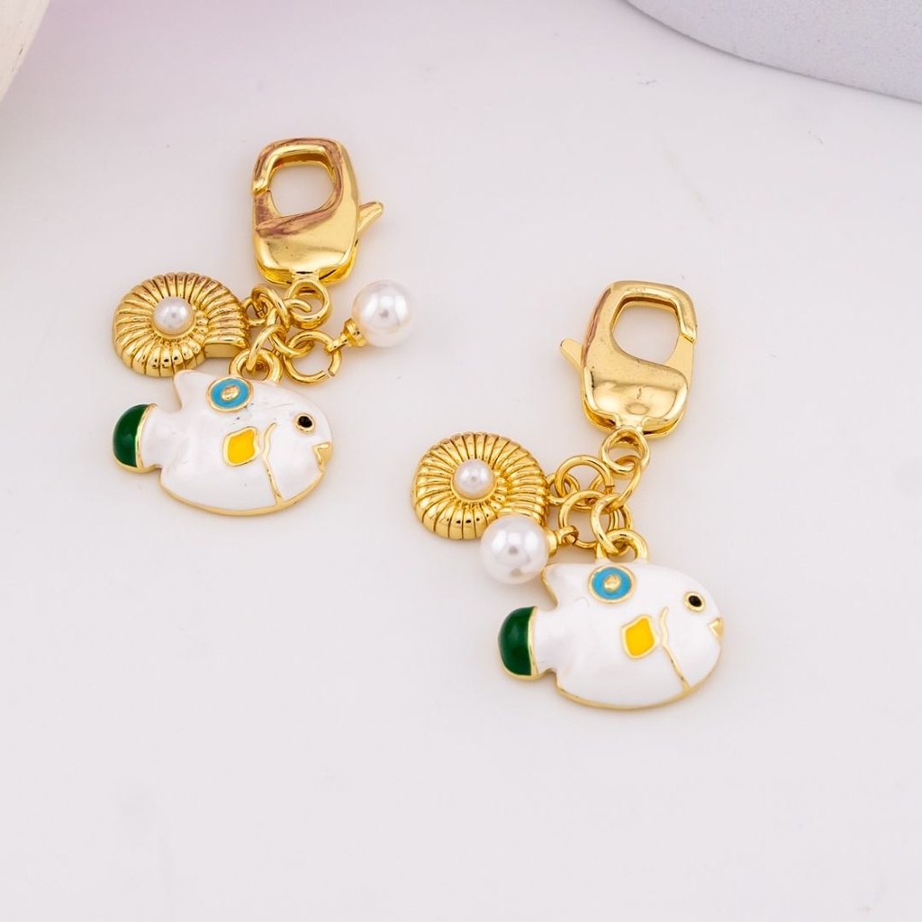 Llavero de verano con zirconias baño 18k